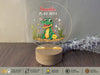 a glass plaque with a picture of a crocodile on it