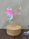 a personalized acrylic with a fairy on it