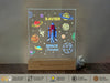 a glass block with a picture of a space shuttle on it