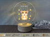 a glass night light with a mouse on it