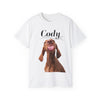 a t - shirt with a picture of a dog sticking its tongue out