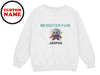 a white sweatshirt with a picture of a monster on it