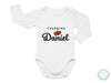 a white bodysuit with the words charming danielle on it