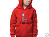 a young boy wearing a red hoodie with the letter l on it