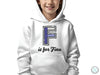 a young boy wearing a white hoodie with the f is for finn on it