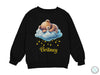 a black sweater with a teddy bear sleeping on a cloud