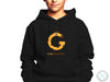 a young boy wearing a black hoodie with the letter g on it