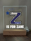 a glass block with the letter z on it