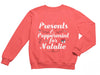 a pink sweatshirt with the words presents and peppermint for natalie on it